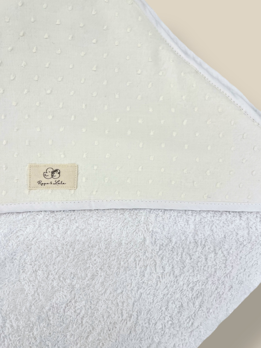 CAPA DE BAÑO PLUMETIS BEIGE